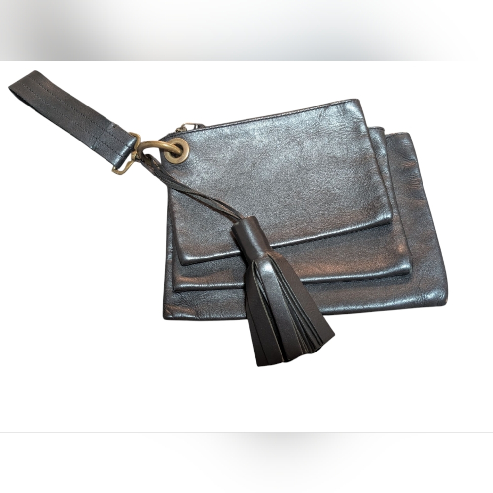 Genuine leather black wristlet/clutch with a tassel